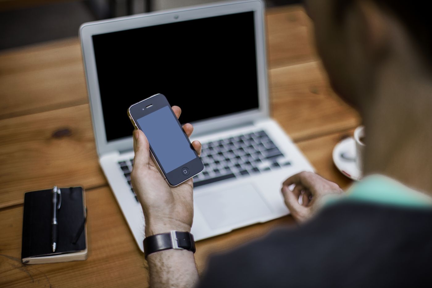 File:Man with smartphone and laptop (Unsplash).jpg, Wikimedia Commons