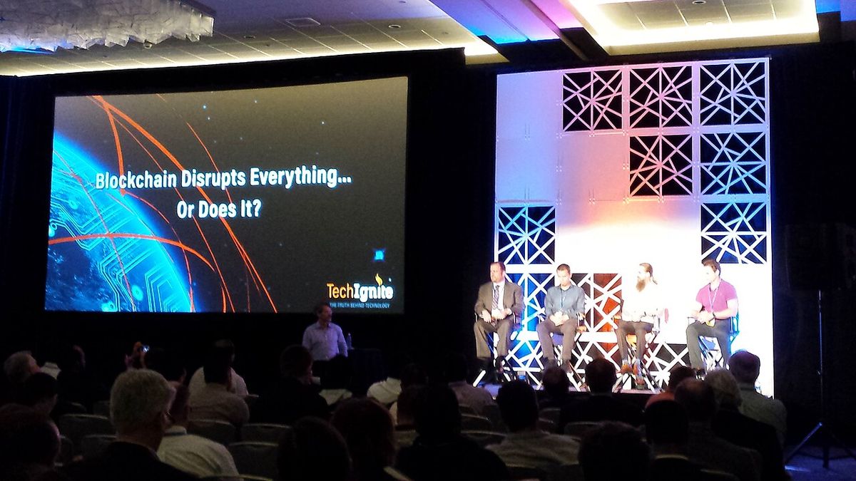 Consultant Josh Greenbaum moderates the "en:Blockchain Disrupts Everything...or Does It?" panel discussion at the first IEEE Computer Societ