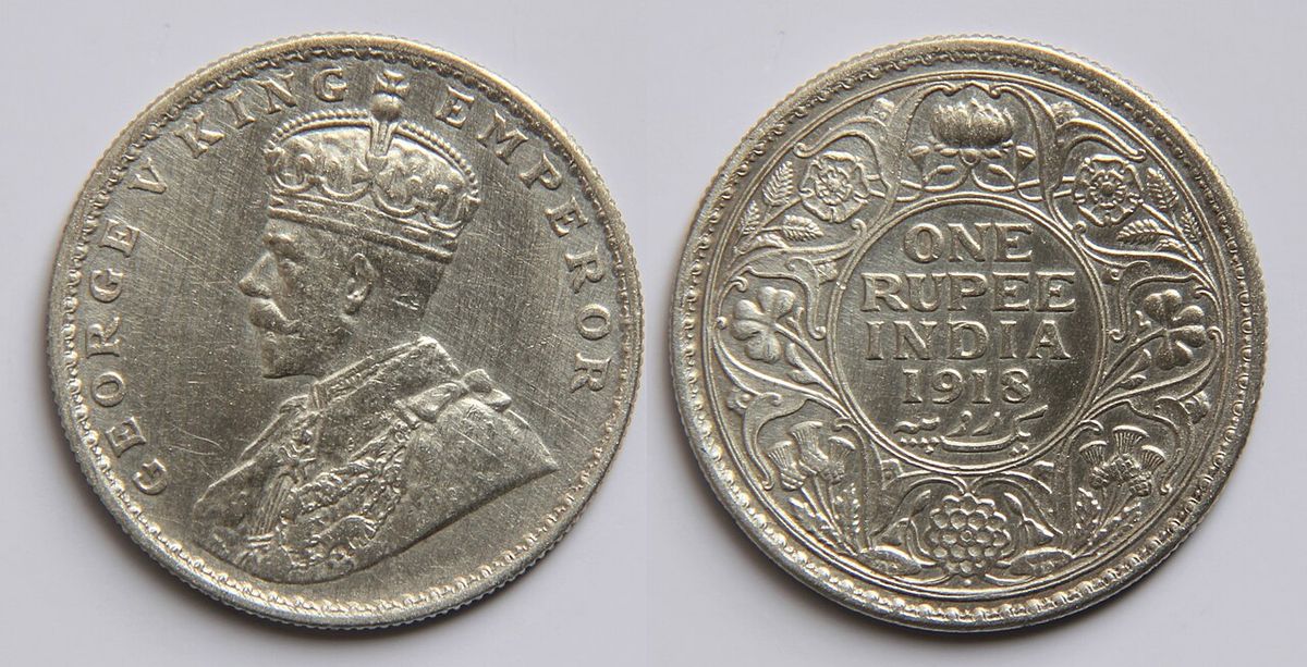 Face value: 1 Indian rupee coin. Country: Indian. Year of minting: 1918. Metal: Silver. Shape: Round. Obverse: Profile of George V surrounde