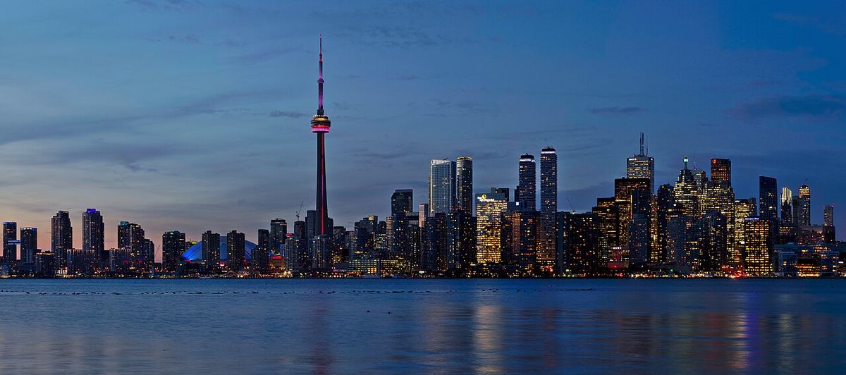 Picture of the Toronto skyline at sunset taken from the Snake Islands of the Toronto Islands. This is a crop of a larger panorama.