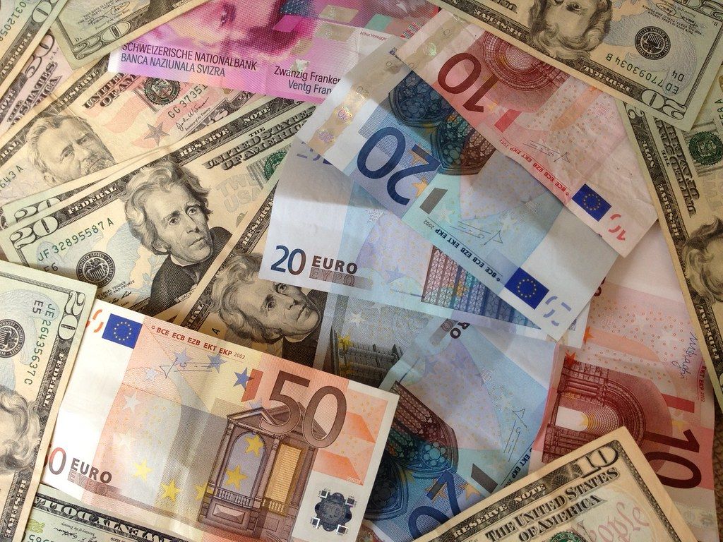 US dollars and Euros, cash banknotes | A stock photo of dol… | Flickr