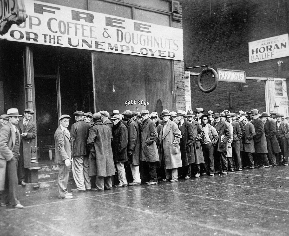 The storefront sign reads "Free Soup Coffee & Doughnuts for the Unemployed."