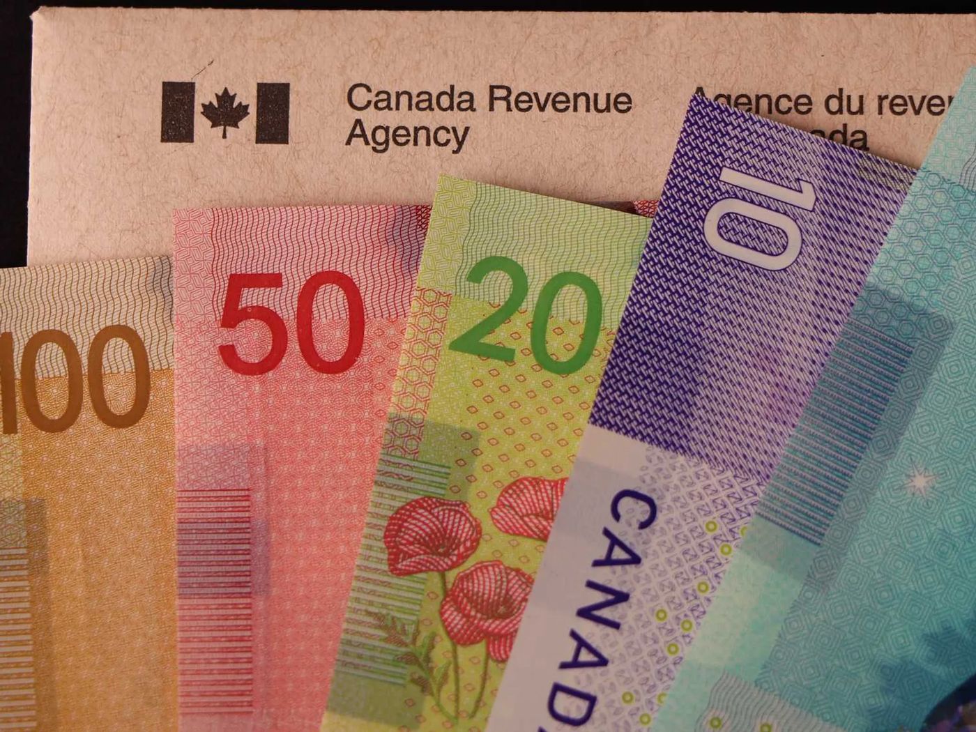 The CRA has over $1.8B in uncashed cheques and here's how to find out if  you can get money, Narcity