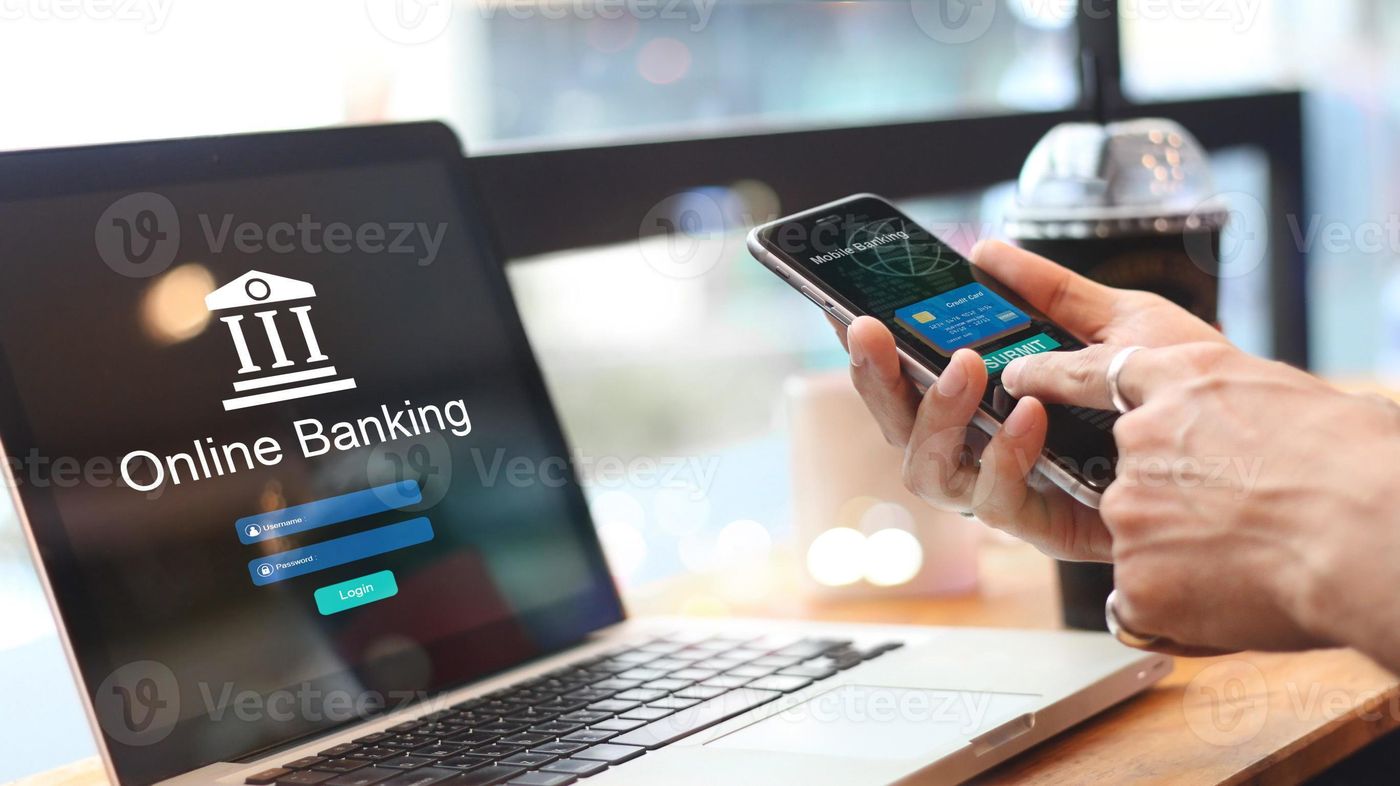 Man using online banking with credit card on touch screen device. Digital  and internet payments.Bank login on a laptop screen. All on scree