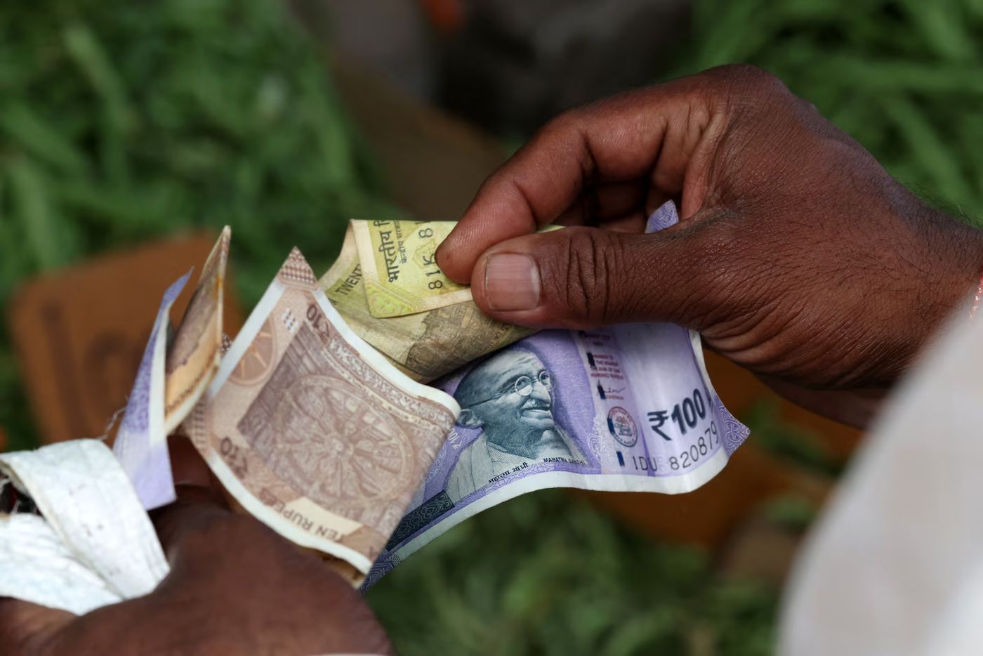 Rupee logs biggest rise in over a month as traders see risks of additional  US tariff ebbing | Reuters
