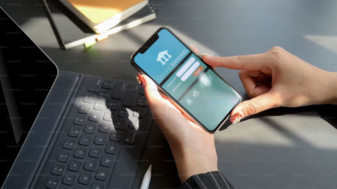 Person using online banking on smartphone, Photo on Unsplash+
