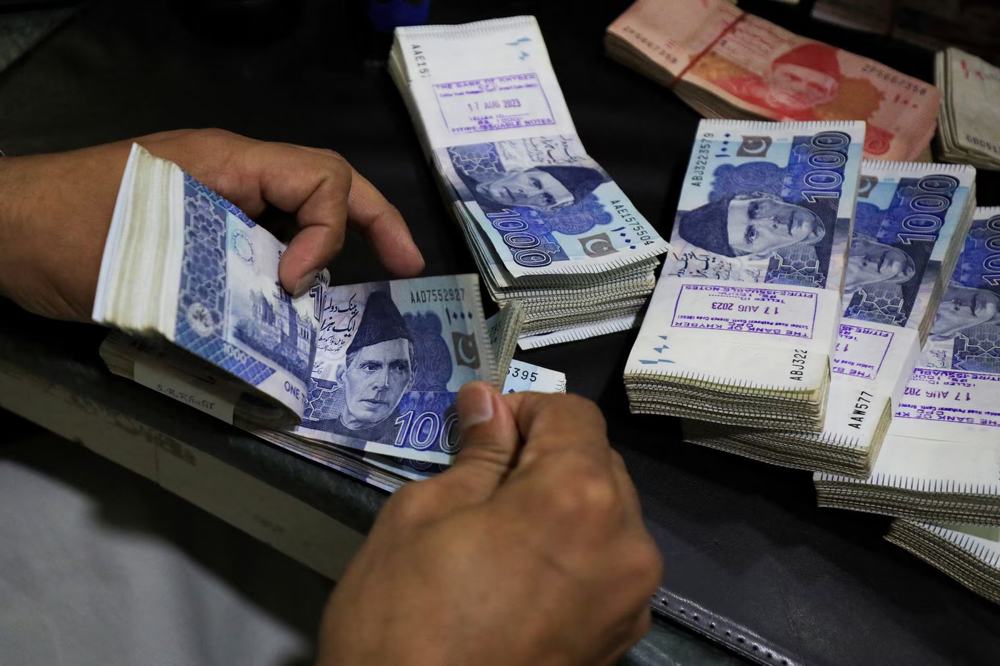 Pakistan rupee hits record low against US dollar, Central Bank | Reuters