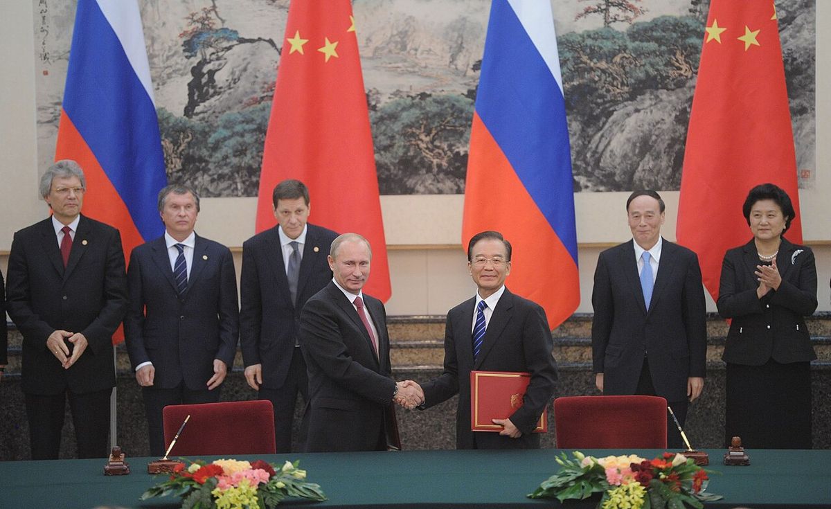 Vladimir Putin of Russia and Wen Jiabao of China