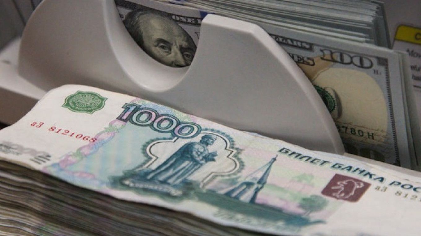 Russia's Ruble Falls Below 56 to U.S. Dollar for First Time This Year, The  Moscow Times