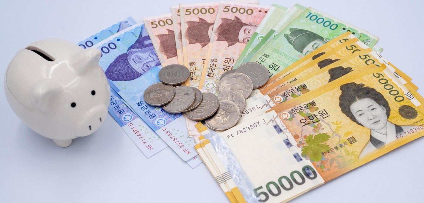Korean won notes and Korean won coins for money concept background ...