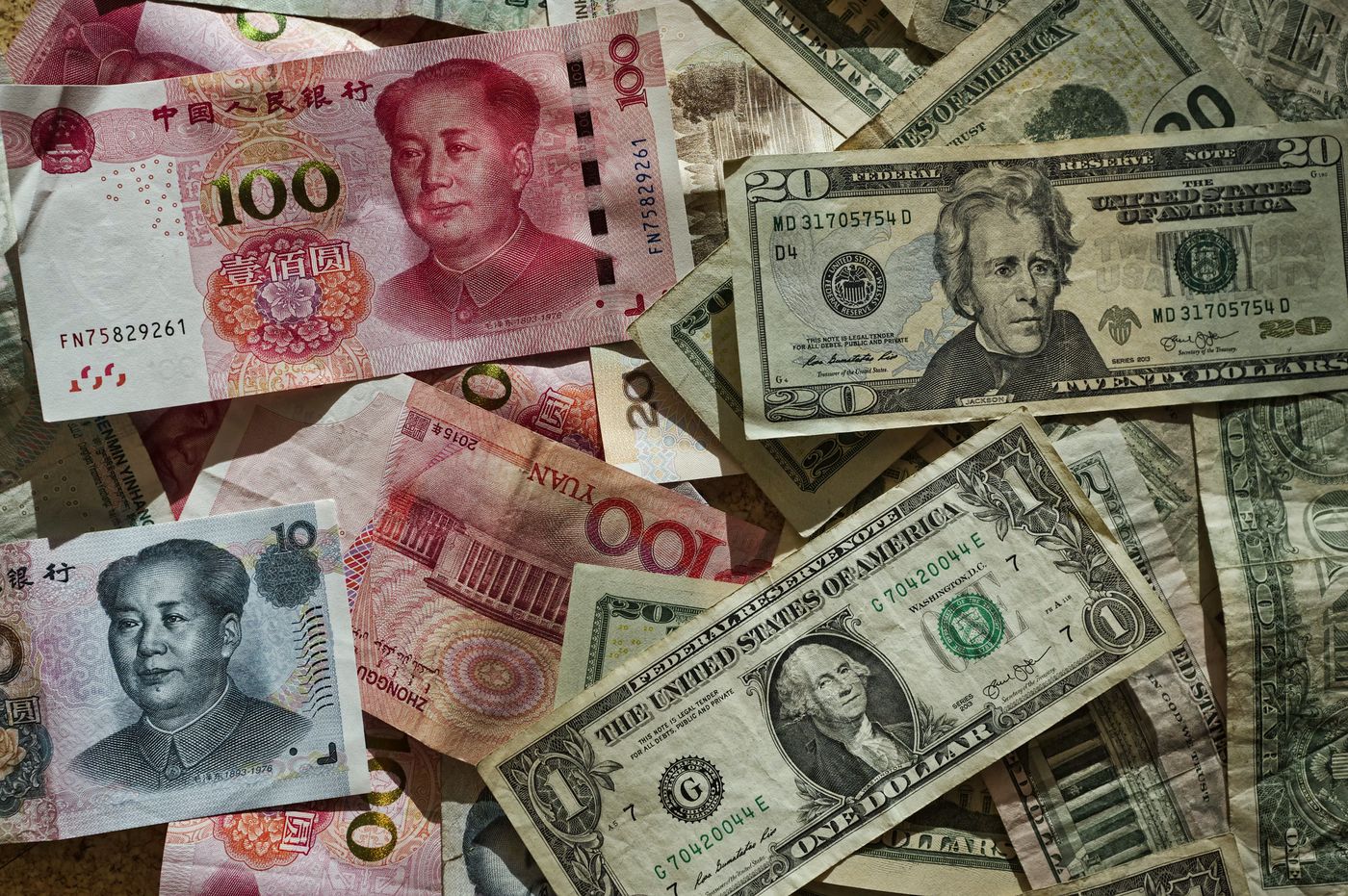 US dollar and Chinese yuan banknote lot, Free Photo on Unsplash