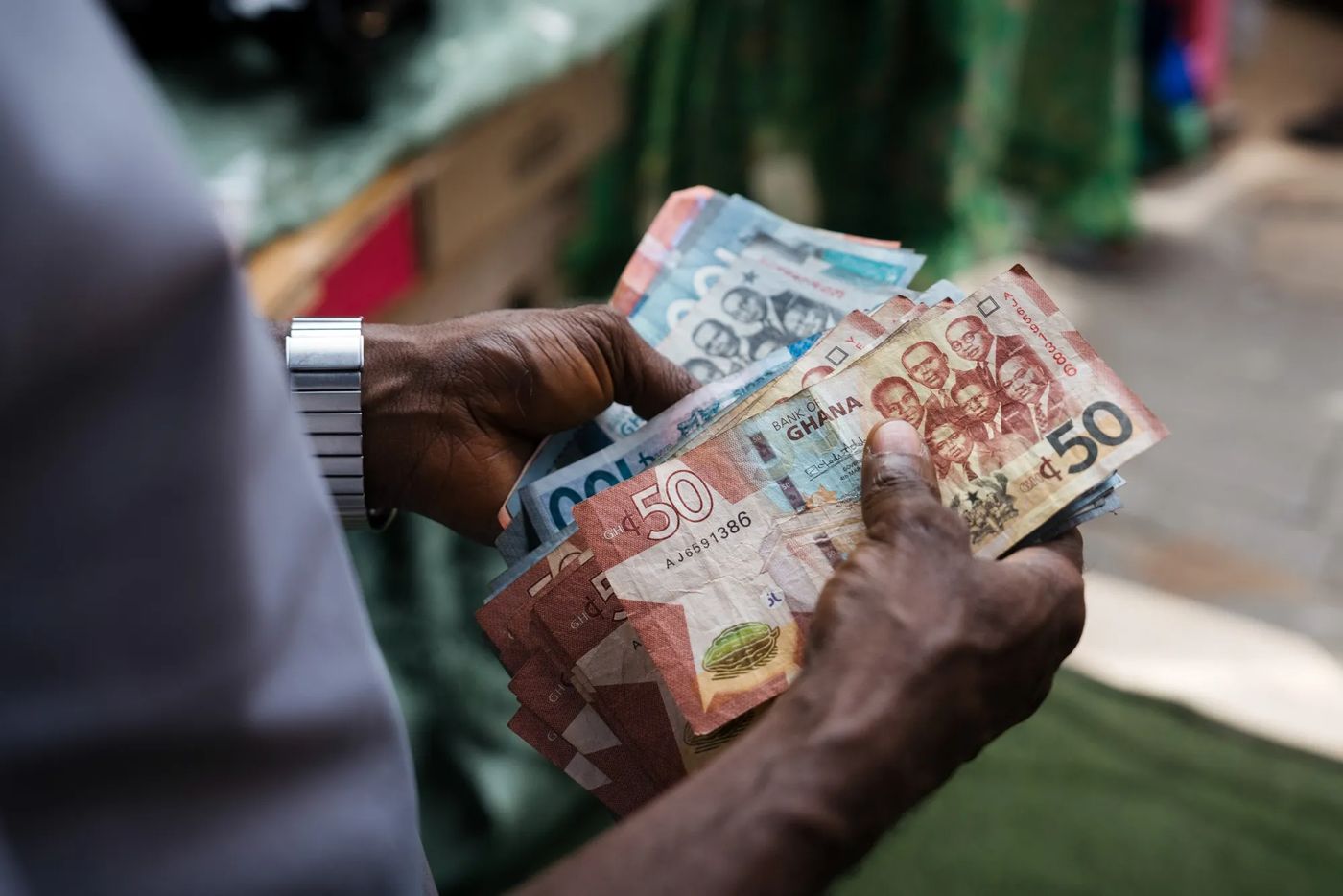 Cedi Nudges Lower as Dollar Strengthens on Global Tensions | The High  Street Journal