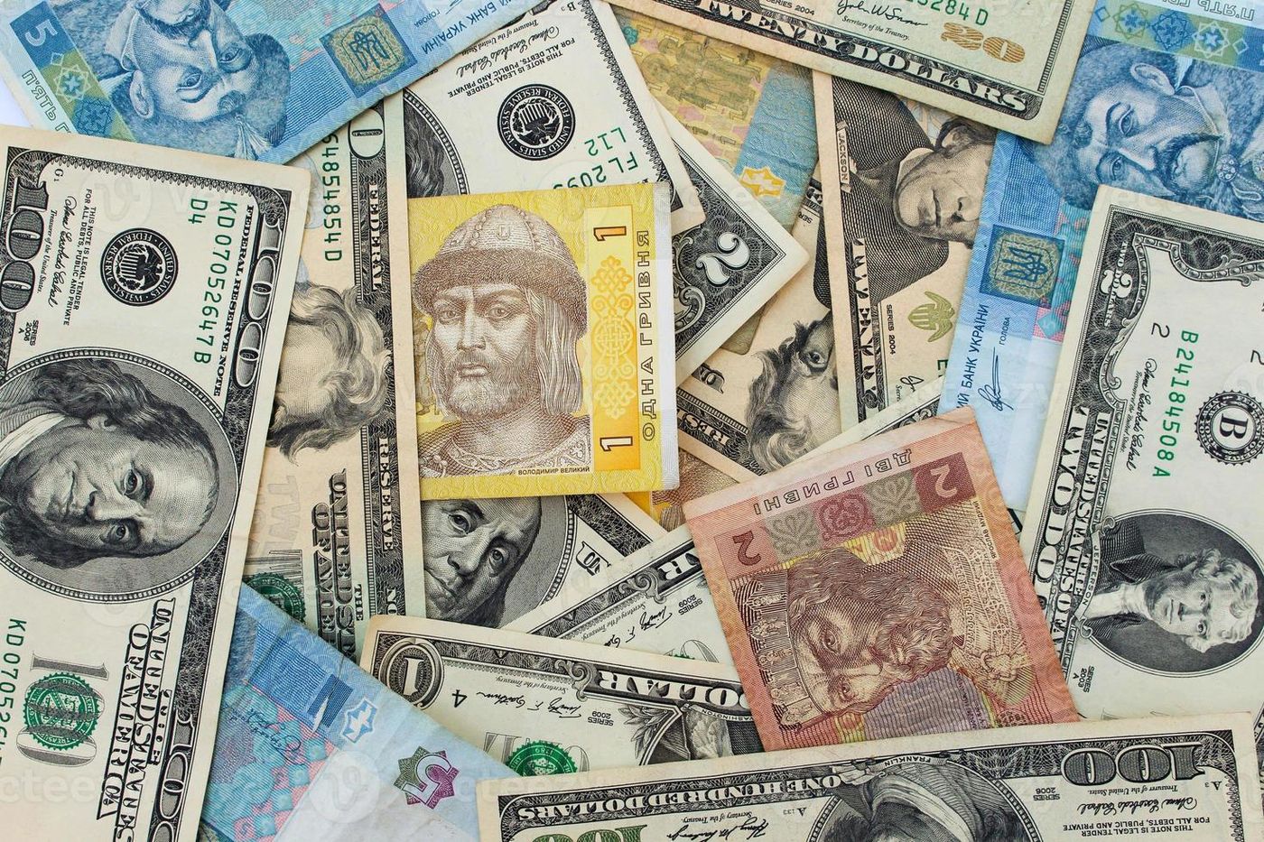 Background banknotes of us dollars and Ukrainian hryvnia 22790522 Stock  Photo at Vecteezy