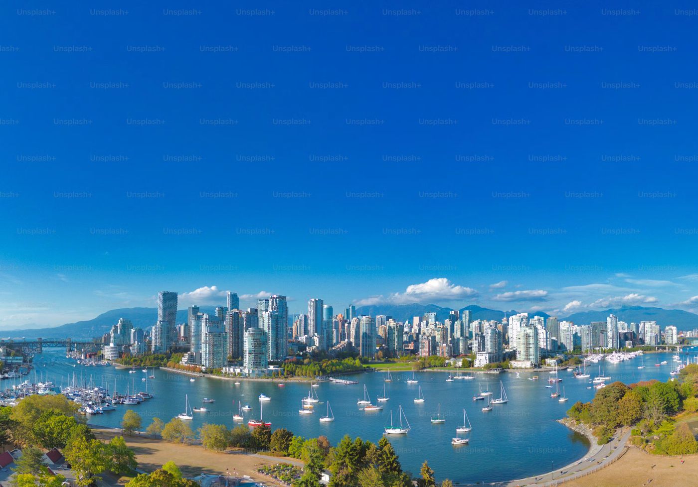 A beautiful shot of the Vancouver skyline on a sunny day in British Columbia, Canada, Photo on Unsplash+